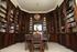 The exquisite 30ft library - dining room features original ornate bookshelves