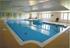 Residents enjoy the exclusive use of the communal indoor heated pool and Jacuzzi