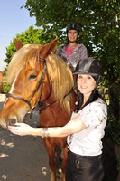  - laura-bellamy-of-taylor-wimpey-with-a-member-of-leybourne-grange-riding-centre
